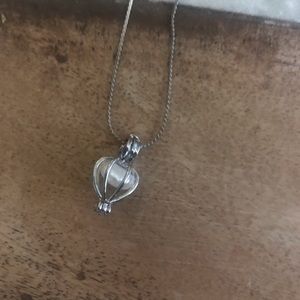 Lab made pearl in cage pendant necklace